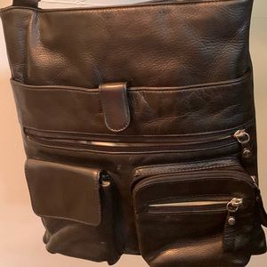 Bags. Blk crossbody. Multi-pockets Good condition. Will also include Coach bag